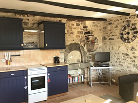 The bright kitchen area.